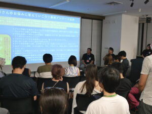 渡部理事の講演の様子